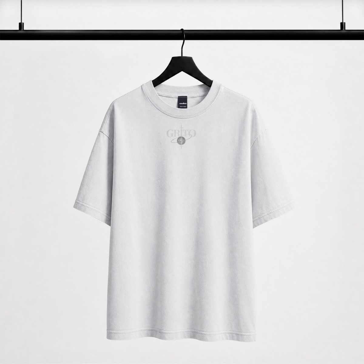 GRITO Muse Tee in white — small GRITO star mark on the chest