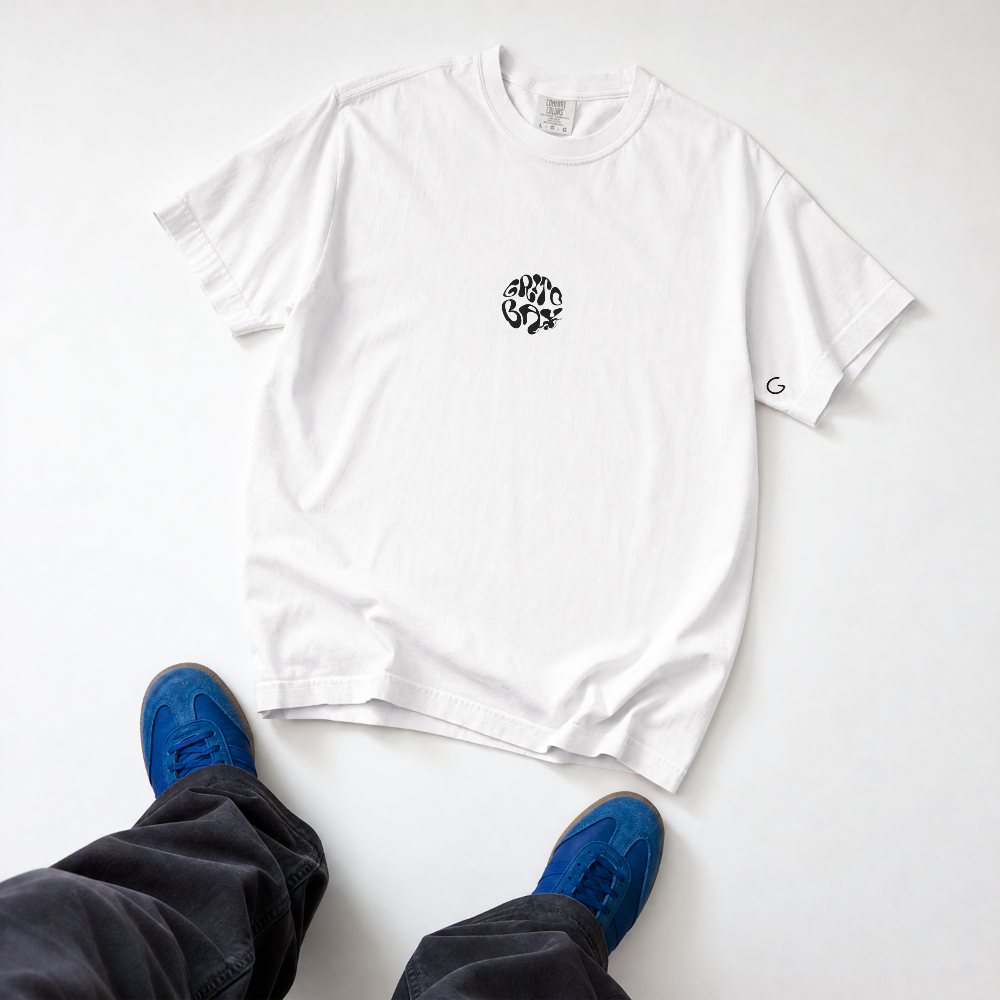 GRITO Bay Tee in white — small bubble mark on the chest