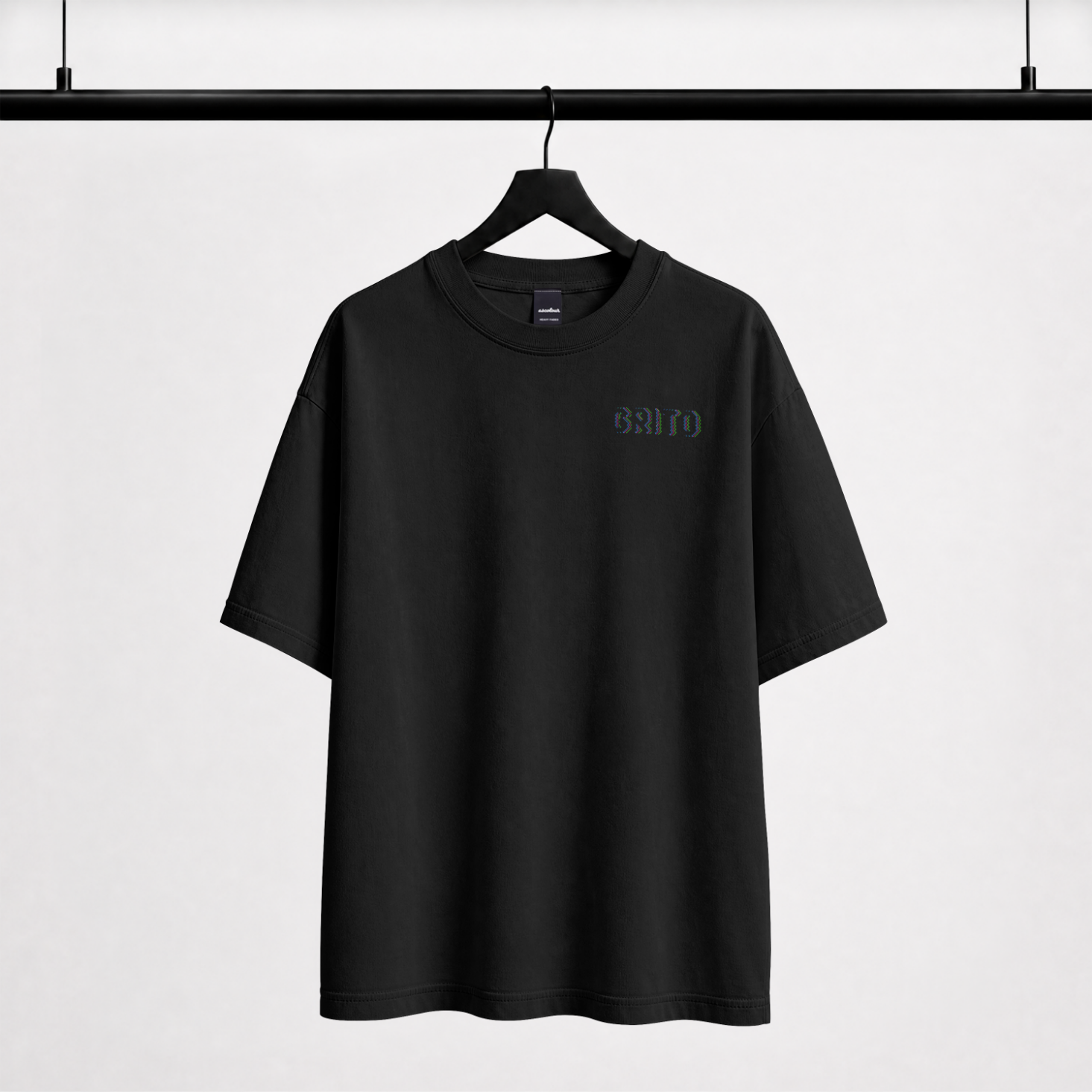 GRITO Glitch Tee in black — front chest print